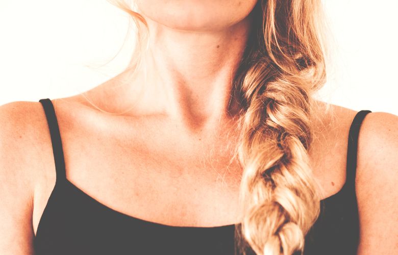 braided hair over one shoulder